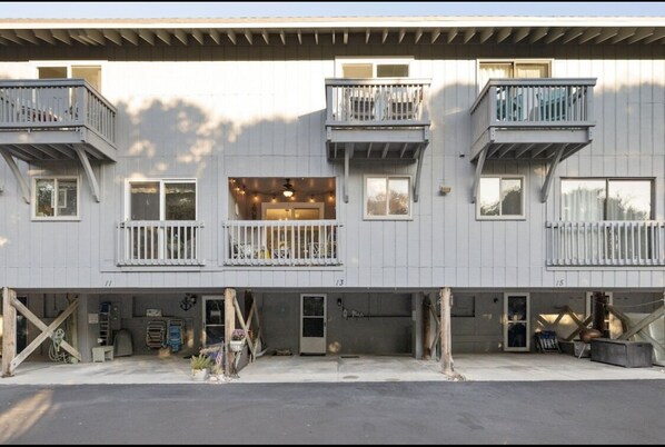 Ocean Glen  West #13 Carport at entry offers one parking space and keyless entry