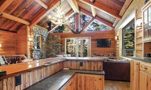 Family room with custom elk antler chandelier