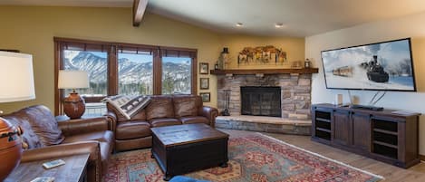 Living Room with Mountain Views, Fireplace, and Smart TV