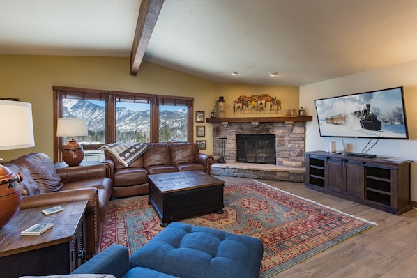 Living Room with Mountain Views, Fireplace, and Smart TV