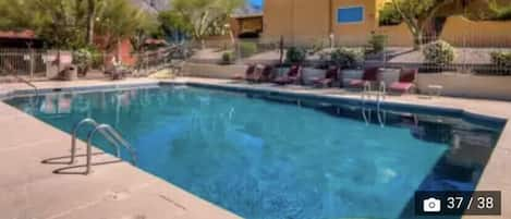 Outdoor pool with hot tub and Mountain View’s