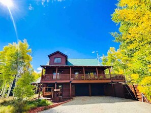 The Lakehouse - One of Colorado's most unique and spectacular luxury vacation homes!  This real log cabin features it's own private lake, is centrally located to all of the major ski resorts, 14'ers and is just over an hour from Denver!