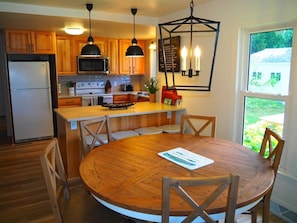 OVERALL: The lovely dining area between the kitchen and living room.
