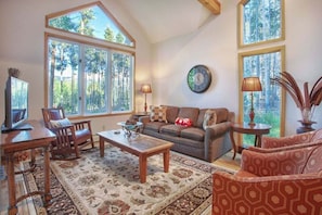 Second living area in front of house with sleeper sofa beautiful mountain views.