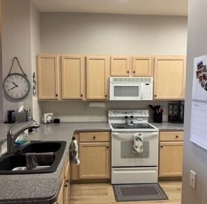 Fully stocked kitchen with additional appliances: :air fryer, instapot, Keurig. 