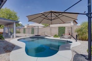Shaded coverage for the pool  is optional with two large Cantilever umbrellas