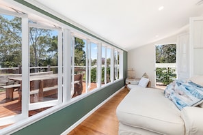 Feel the sea breeze as you lounge on the daybed in the sunroom ~ upstairs 