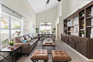 Our living room includes modern design, high-speed internet, and a plush sofa and chairs!
