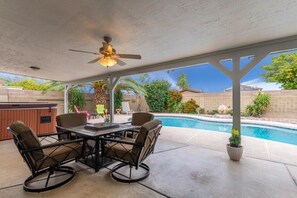 Backyard Patio w/ propane firepit & hot tub.