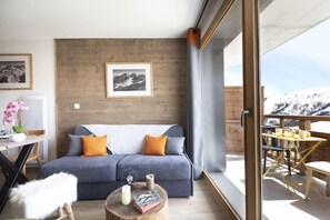 You'll love our bright and open living area. Some apartments may feature a balcony or terrace.