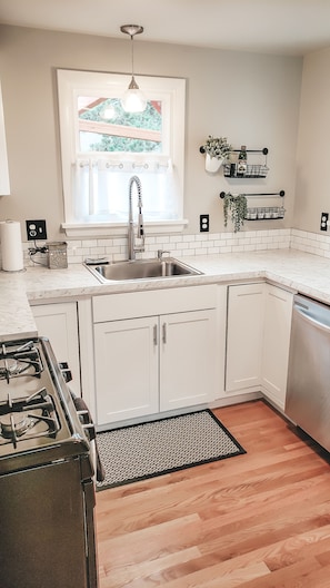 Kitchen is well stocked - toaster, blender, utensils, pots & pans, plates, etc. 