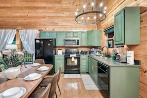 Unleash your inner chef and whip up your favorite meals in our spacious, fully equipped kitchen - the perfect place to indulge your culinary creativity.