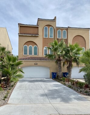 Private 1 car garage and space for 2 additional vehicles on the driveway.