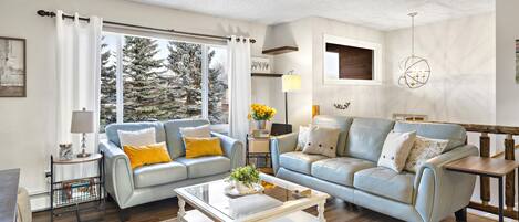 Enjoy comfortable, new furniture, seasonal decor, and lots of natural light.