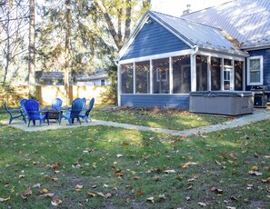 Fenced backyard with hot tub
