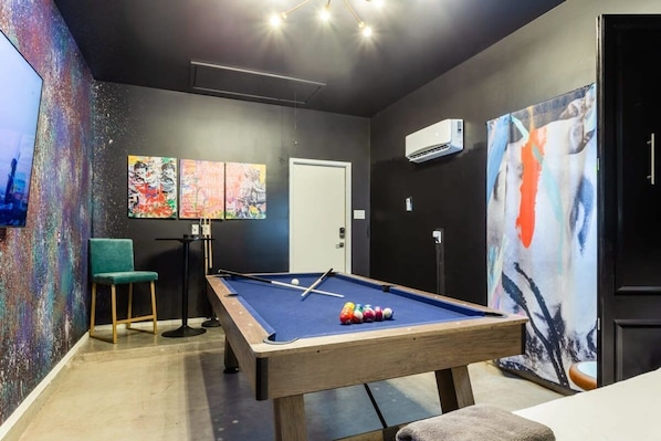 Pool Table And Smart-Tv In The Game Room
