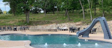 Slide into one of two pools. 