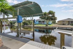 Covered boat lift included with the rental 