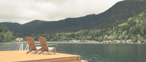 Sit on our private dock to take in the mountain views