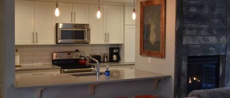 Welcome to our Vail home - the fully equipped kitchen is ideal for cooking 