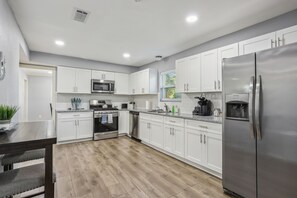 Large Modern Kitchen with stainless steel appliances