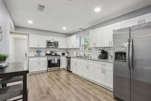 Large Modern Kitchen with stainless steel appliances
