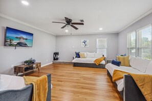 Bedroom 2, with 6 twin beds and 55” Roku TV. Each trundle bed has 2 twin beds.