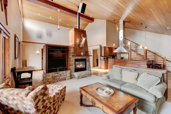 Expansive open floor plan with beautiful wood ceiling