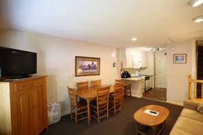 Living Room with Dining Table in Condo at Waterville Valley
