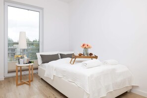 Cozy bedroom with a double bed and modern decor