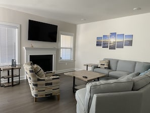 great room with gas fireplace