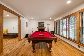 Play pool, turn on the gas fireplace, and listen to a record in the front music room!