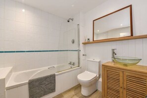 Bathroom with shower over bath