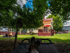 Enjoy resting in the hammock in the large backyard or rest on the lounge chairs