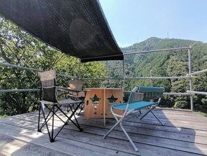 There is an outside table and chairs.