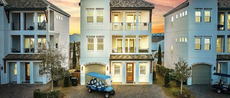 6-seat Golf Cart FREE during your stay! 2 minutes to the beach. Sleeps 15, 6 bedrooms, 5.5 bath, and 10 beds. Game room and bunk rooms. Heated pool across from the house!