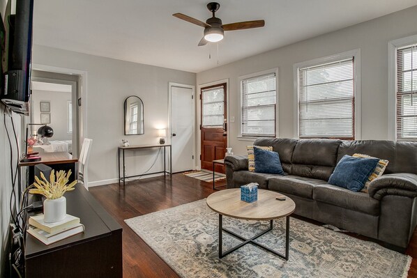 Relax and unwind in our spacious & bright living room.