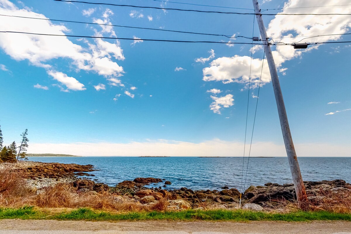 Two-story, dog-friendly home with gas grill, deck, & bay views- near the ocean