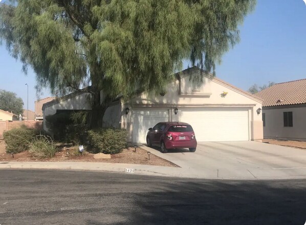 House Front and Garage Entrance.