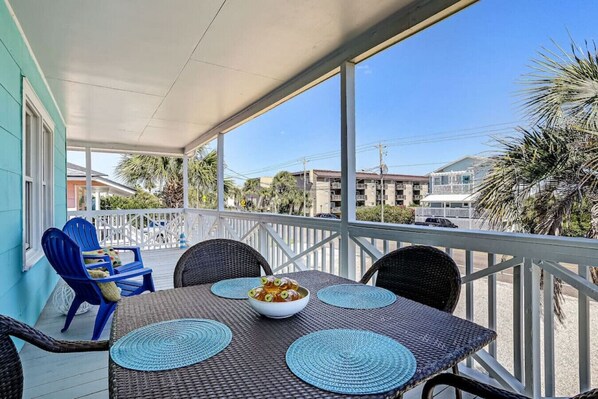 Private deck with 4-person dining table + 2 Adirondack chairs