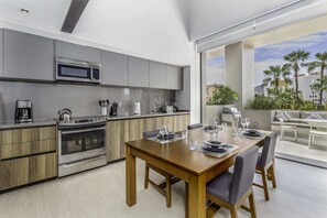 Fully equipped modern kitchen with cookware.