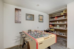 Foosball, desk, lots of games and cards