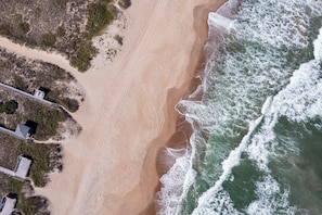 Enjoy wide beaches just across the street from our home
