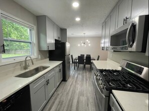 Brand New Cabinets, Quartz Countertops & High end Appliances