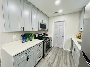 Fully stocked kitchen with all brand new appliances.