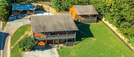 View from a drone of the two houses and covered patio