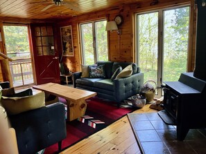 A pleasant interior space. Beyond the trees, you can see the lake.