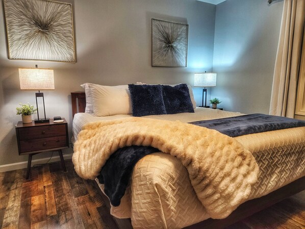 New King Bed- Hybrid Mattress. Blinds with room darkening curtains