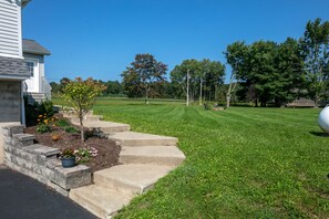 Lovely landscaping leading to your entrance