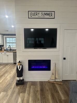 Electric fireplace and large screen television